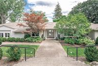 BEAUTIFUL GOLD COAST LAKE HOME WITH OVER 300 FEET OF LAKE FRONTAGE