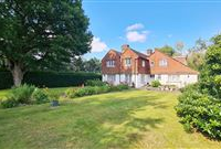 HANDSOME FAMILY HOME IN MID-SUSSEX VILLAGE WITH MATURE GARDEN