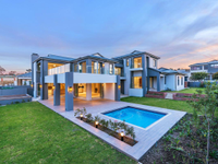 LUXURY MASTERPIECE OVERLOOKING A GREENBELT