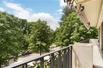 SECOND FLOOR APARTMENT WITH AN OPEN VIEW OF THE WOODS