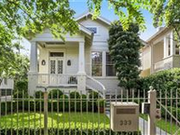 STUNNING CORNER LOT HOME WITH PROFESSIONALLY DESIGNED YARDS