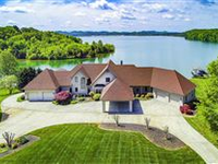 A RARE LAKEFRONT HOME ON THE MAIN CHANNEL OF TELLICO LAKE