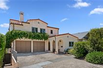 GORGEOUS SPANISH STYLE HOME WITH A BEAUTIFUL OCEAN VIEW