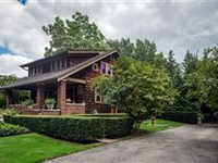 QUINTESSENTIAL CRAFTSMAN BUNGALOW ON BEAUTIFUL PROFESSIONALLY DESIGNED LOT