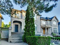 BEAUTIFULLY MAINTAINED CUSTOM-BUILT HOME WITH GARDENS