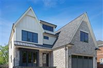 HOME IN IDEAL ELMHURST LOCATION