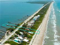PARADISE AWAITS IN THIS FABULOUS OCEAN TO RIVER OCEANFRONT ESTATE