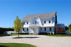 STUNNING, BRIGHT, LAKEFRONT SHINGLE TRADITIONAL
