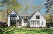 STUNNING MODERN HOME NESTLED IN HIGHLY SOUGHT AFTER LANSDOWNE NEIGHBORHOOD