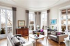 BEAUTIFULLY CHIC AND BENEFITS FROM A BALCONY RUNNING THE ENTIRE LENGTH OF THE APARTMENT