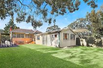 FLEXIBLE BRICK HOME ON LOVELY, TREELINED STREET
