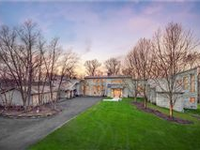 BRILLIANTLY DESIGNED CUSTOM ESTATE ON 10-PLUS ACRES