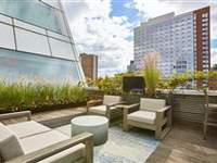 SUNNY HIGH-RISE PENTHOUSE WITH PANORAMIC NEW YORK CITY VIEWS