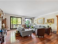 PEACEFUL APARTMENT WITH A BALCONY ENJOYING A VIEW OF THE SEINE