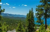 THIS ONE OF A KIND, PANORAMIC LAKE AND MOUNTAIN VIEW HOME