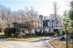MAGNIFICENT HOME WITH AN EXQUISITE ESTATE-LIKE PROPERTY ON LOVELY ACRES IN COMPLETE PRIVACY