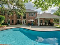 TIMELESS CUSTOM ESTATE IN PREMIER GATED COMMUNITY