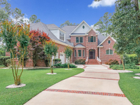 CUSTOM CRAFTED ALL-BRICK WATERFRONT HOME