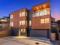 NEW CONTEMPORARY HOME WITH LUXURIOUS FINISHES IN PRIME LOCATION
