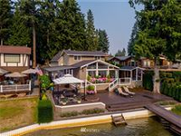 BEAUTIFUL LAKEFRONT HOME WITH WONDERFUL SUNSET VIEWS