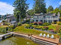 PEACEFUL OPPORTUNITY IN THIS LAKEFRONT ESTATE WITH MOUNTIAN VIEWS
