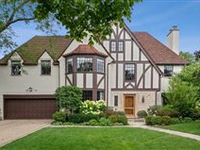 MAGNIFICENT TUDOR HOME WITH BEAUTIFUL BACKYARD OASIS