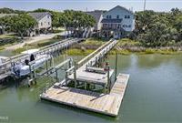CHARMING COTTAGE DIRECTLY ON A DEEP WATER CHANNEL