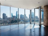 SLEEK HIGH-RISE CONDO WITH SWEEPING DALLAS SKYLINE VIEWS