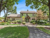 CUSTOM-BUILT FAMILY ESTATE WITH LUSH GARDENS