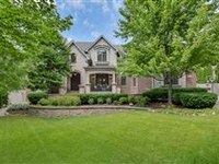 EXQUISITE SMART HOME IN COVETED OAK HILLS