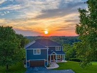 STUNNING NEW HOME WITH SPECTACULAR SUNSET VIEWS
