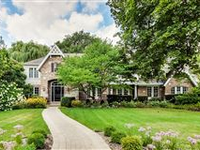 BEAUTIFUL CUSTOM HOME WITH A COUNTRY ESTATE FEEL