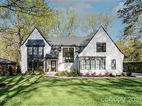 STUNNING MODERN HOME NESTLED IN HIGHLY SOUGHT AFTER LANSDOWNE NEIGHBORHOOD