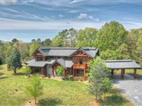 ONE-OF-A-KIND WATERFRONT AND MOUNTAIN ESTATE