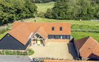 REMARKABLE RUDGWICK ESTATE SET ON FOURTEEN ACRES
