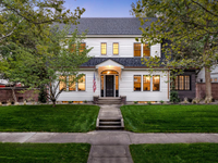 STRIKING DUTCH COLONIAL ON HISTORIC HARRISON BLVD