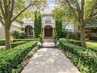 STUNNING NORTHVILLE LAKEFRONT HOME WITH BEAUTIFUL PANORAMIC VIEWS