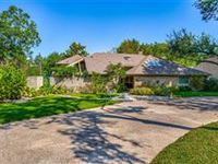 LIGHT AND SPACIOUS CONTEMPORARY RESIDENCE WITH CUSTOM FEATURES THROUGHOUT