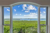 PERFECTLY POSITIONED BAYVIEW II HOME WITH UNOBSTRUCTED VIEWS