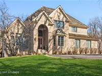METICULOUSLY MAINTAINED CUSTOM BRICK AND CEDAR HOME