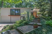 STYLISH MID-CENTURY MODERN HOME WITH GORGEOUS VIEWS OF BERKSHIRE CREEK NATURE AREA