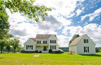 STUNNING FARMHOUSE WITH ACRES OF BEAUTIFUL FARMLAND