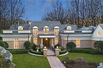 SUPERB SIX BEDROOM HOME ON TWO GATED ACRES