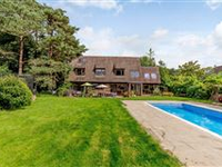 STRIKING AND UNIQUE HOME IN BEAUTIFUL RURAL SETTING