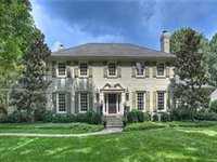 PAINTED BRICK HOME ON HEAVILY LANDSCAPED LOT