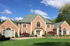 MAGNIFICENT BRICK MANOR ESTATE WITH GRAND ENTRYWAY