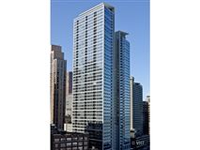 LUXURY HIGH-RISE APARTMENT WITH VIEWS OF LAKE MICHIGAN