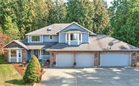BEAUTIFUL FAMILY HOME ON OVER FOUR ACRES