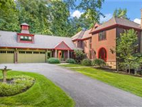 STONE AND SHINGLE MANOR IN EXCEPTIONAL CHAGRIN RIVERFRONT LOCATION