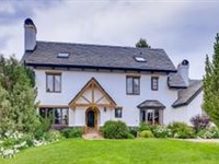 CHARMING EUROPEAN-INSPIRED HOME IN GATED CORDILLERA DIVIDE